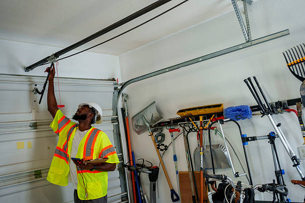 Professional Garage Door Panel Replacement technician working in Hillsboro, ND